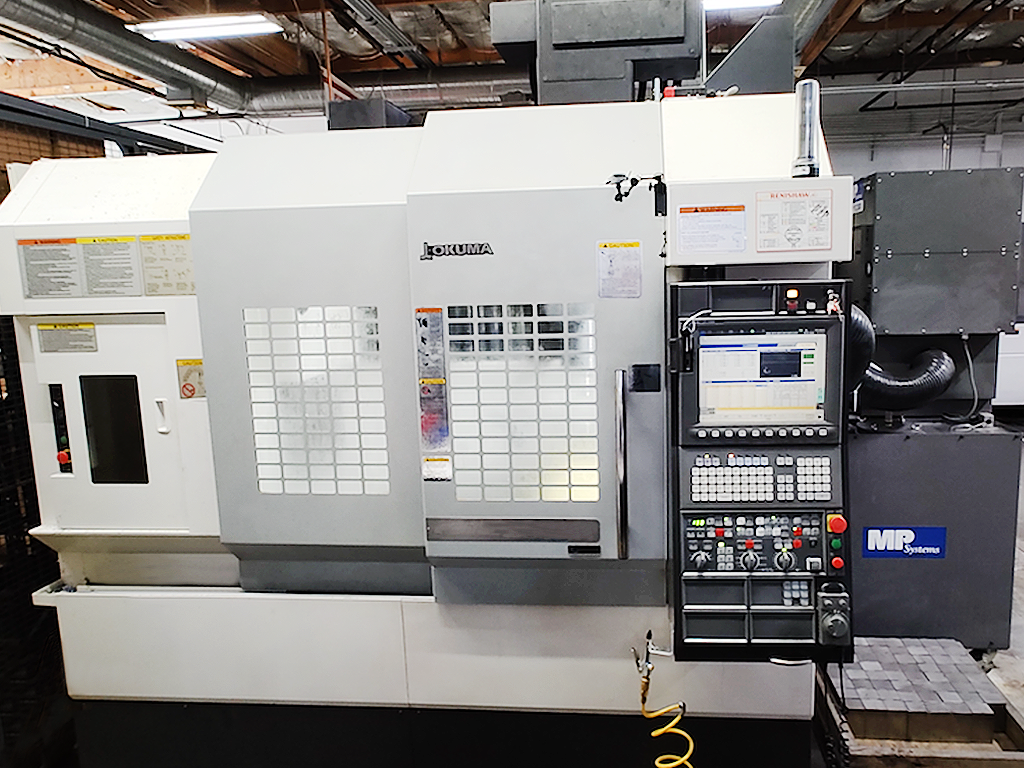 Used OKUMA GENOS M560V Vertical Machining Center #8517