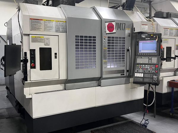 Used OKUMA GENOS M560V Vertical Machining Center #12560